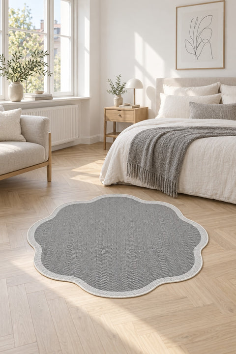 Striped Modern Round Kitchen Rug – Gray in a bedroom