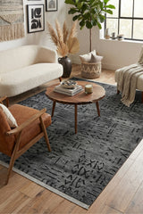 Striped Scandinavian Area Rug – Charcoal in a living room
