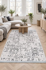 Striped Scandinavian Area Rug – White in a living room