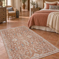 Vintage Modern Area Rug – Terracotta in a bedroom