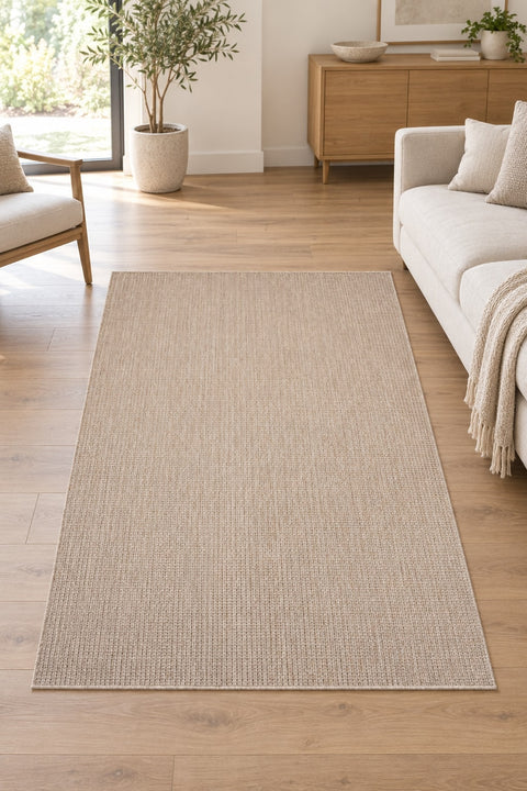 Woven Boho Area Rug – Beige in a living room