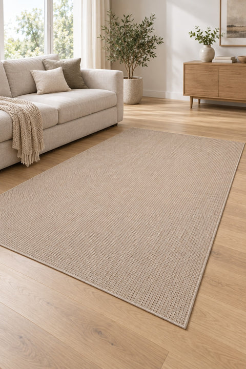 Woven Boho Area Rug – Beige in a living room