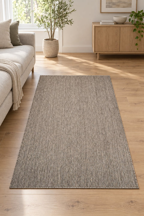 Woven Boho Area Rug – Gray in a living room